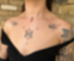 handpoke Symmetrical japanese flames and ornamental dots chest tattoo