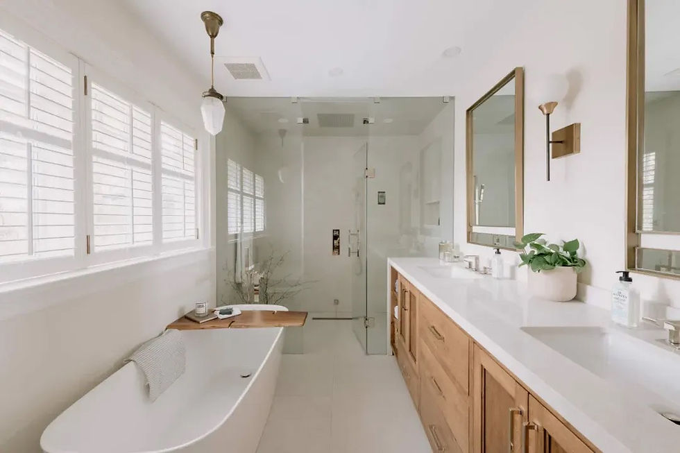 Modern bathroom home renovations with glass shower and tub