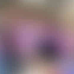 Happy group of workshop attendees seen holding their dahlia bouquets from a Kikko and Koast flower workshop.