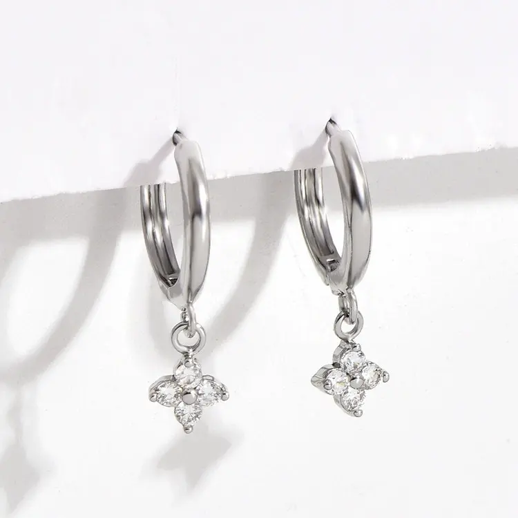 Thumbnail: Silver hoop earrings with sparkling flower charms