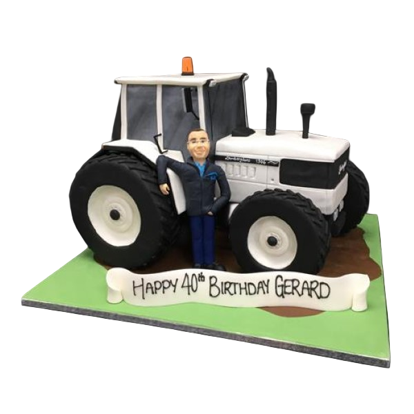 Bespoke tractor-shaped cake with detailed wheels and cabin, perfect for celebration in Solihull, West Midlands.