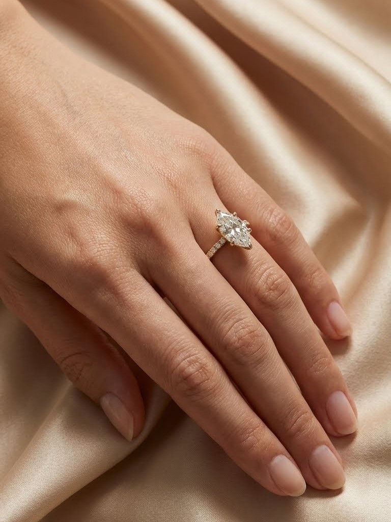 Marquise Cut Moissanite Engagement Ring with Dainty Diamond Band in Yellow Gold