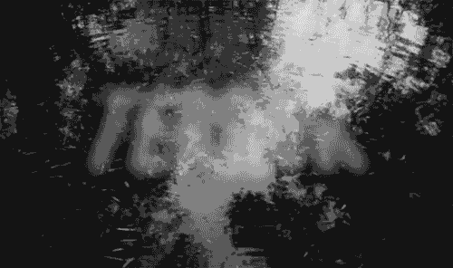black and white shot of still water with the words "Terror" fading into view (ghost encounter blog post)