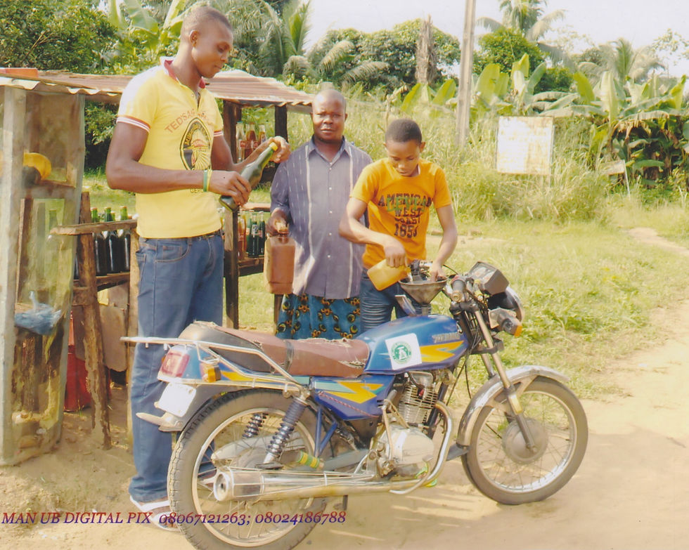 three men in rural Nigeria stand around a motobike