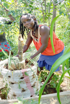 Kenyan woman with a garden