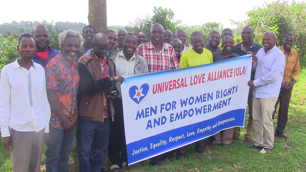 group of men holding a banner