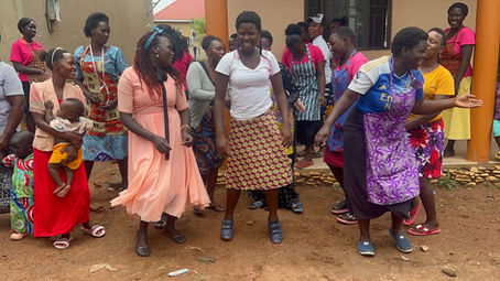 young women in Uganda dancing