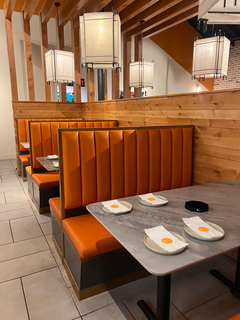 Cozy booths inside of the Phat Eatery restaurant.