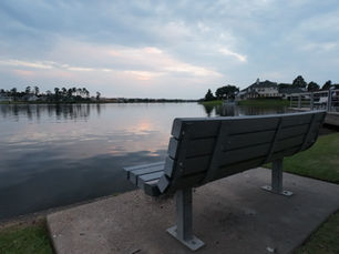 Bench seat at Northshore Park looking over Lake Woodlands