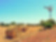 Hay Bales And Windmill