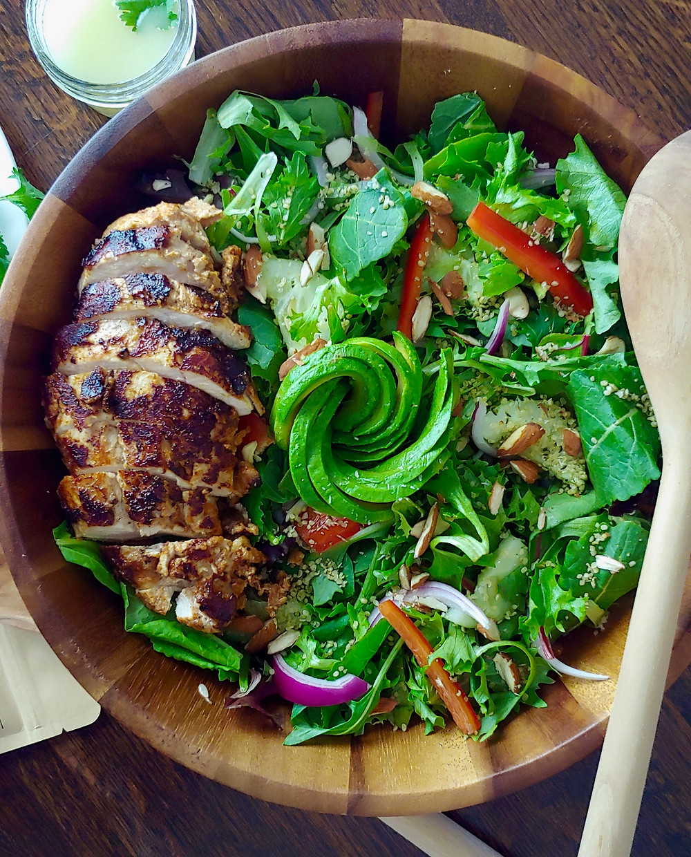 Pan seared chicken breast with a tandoori dry rub served with an avocado salad