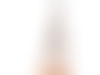 Transparent crystal tower with pink hues at the base, isolated on a white background, showcasing smooth vertical striations.