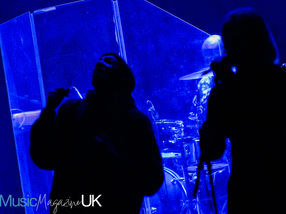 Tricky performs a dark and moody show, lurking in the shadows at the Aviva Studios Manchester