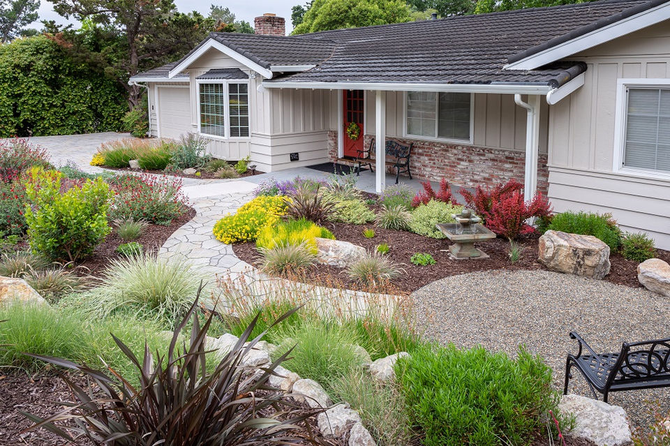 Colorful front entry garden, low water front yard, Mediterranean climate planting design, gravel seating area, Napa Basalt boulders, permeable patio, gravel patio