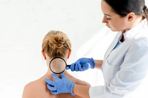 compressed_dermatologist-examining-skin-of-patient-with-magni-2026-03-11-04-13-09-utc.webp