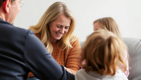 Couples counselling and hypnotherapy for parental burnout featuring a calm family at home, representing children’s counselling and inner calm at Bridge Your Mind.