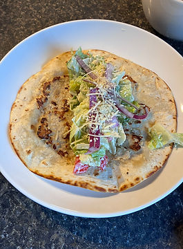 My soon-to-be-married daughter shared this recipe with me and it has earned a permanent spot in my rotation. Easy Caesar Chicken Smashed Burger Tacos are exactly what they sound like — juicy smashed chicken burgers tucked into a warm tortilla and topped with crispy, creamy Caesar salad straight from the bag. Fast, fun, and absolutely delicious. Some of the best recipes come from the people you love most.