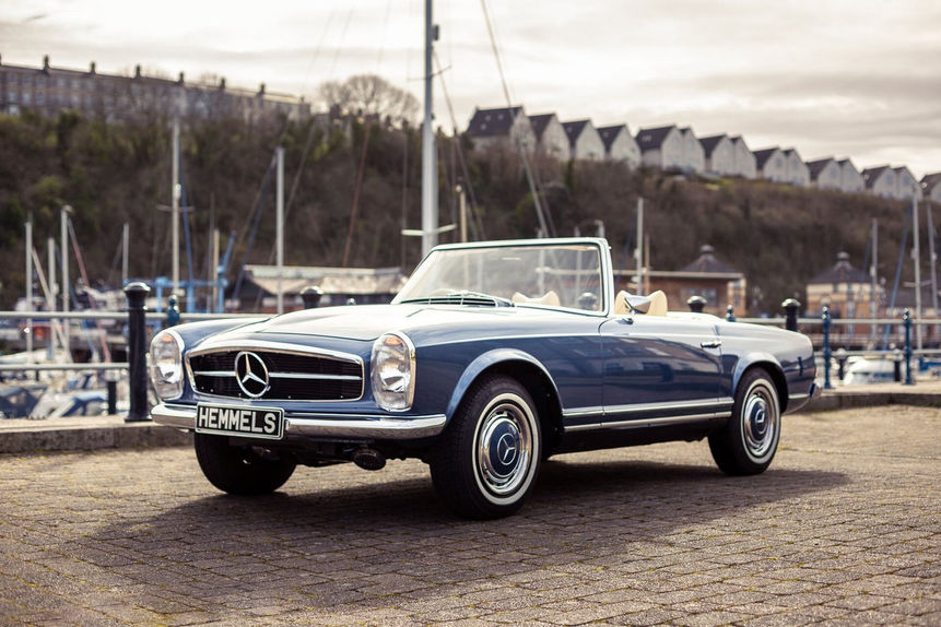 1970 Mercedes-Benz 280SL Pagoda in Metallic Blue photographed outside at Penarth Marina with boats in background