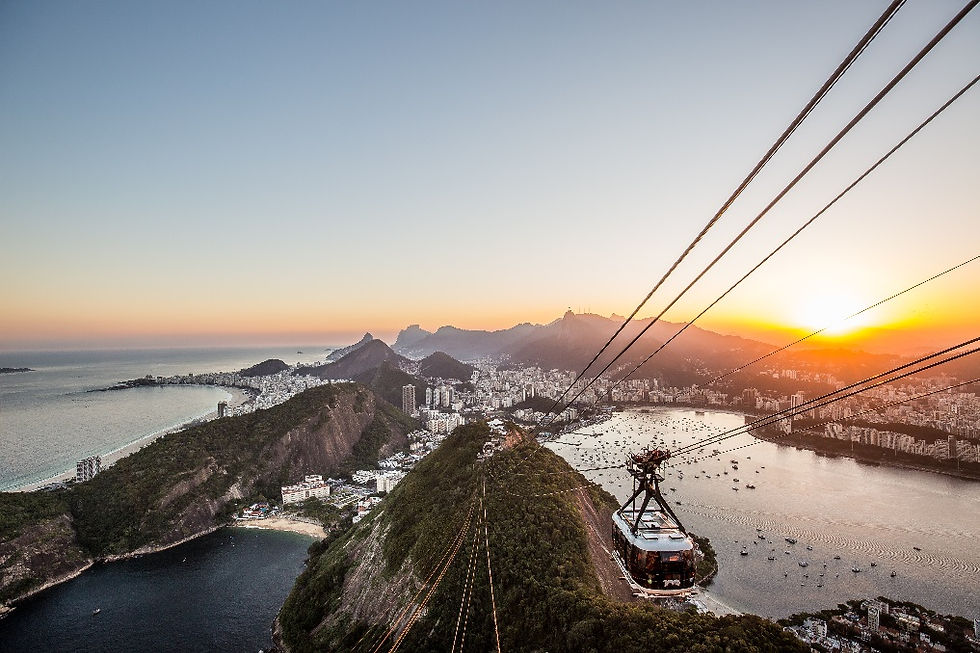 Photograph in raw format of sunset over Rio De Janeiro as viewed from the top of Sugarloaf Mountain