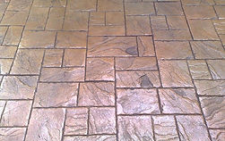 An example of an ashlar stone imprinted concrete driveway design