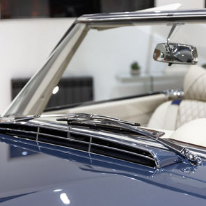 Chrome scuttle panel on a blue electric Mercedes-Benz 280SL Pagoda