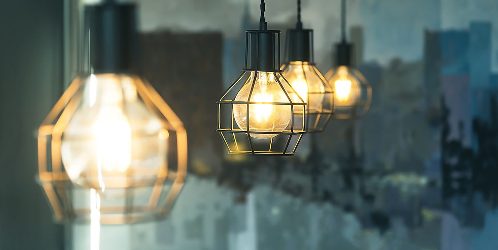 close up of large Edison light bulbs in industrial style fittings
