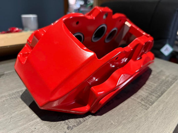 refurbished and painted brake calliper
