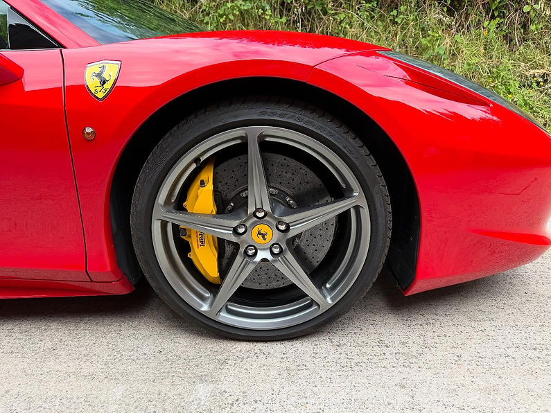 Close up of wheel of a Ferrari