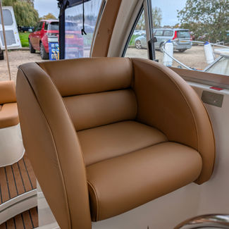 brown leather boat chair