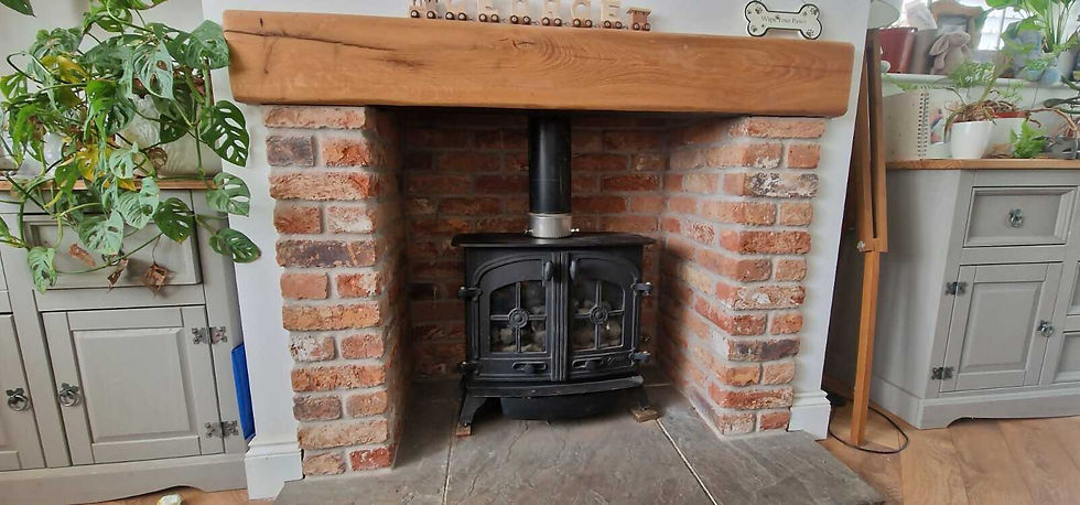 Red brick fireplace and wood burning stove