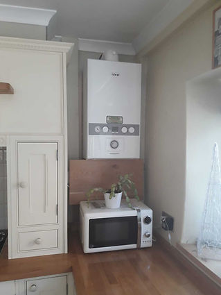 Oil boiler mounted to the wall
