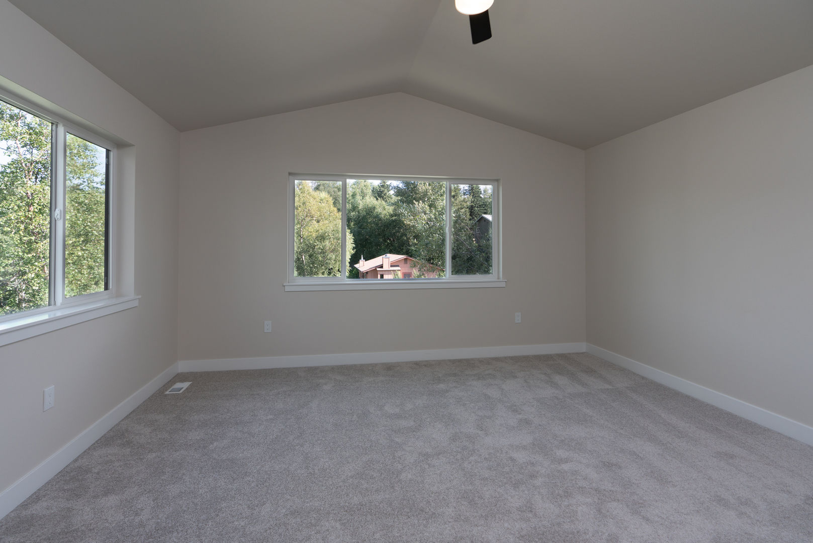 Spacious master bedroom in new construction home in alaska