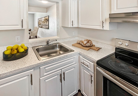 A Kitchen at North Pointe Villas in Gainesville, Florida