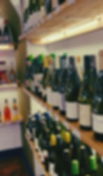 Winebar store refit including LED strip lighting hidden within shelving
