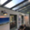 Wall lights installed in an orangery