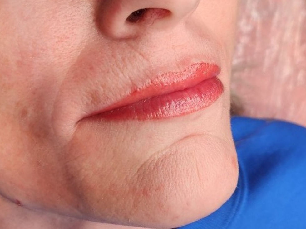 Lip blushing tattoo enhancing natural lip color and restoring soft, balanced definition.