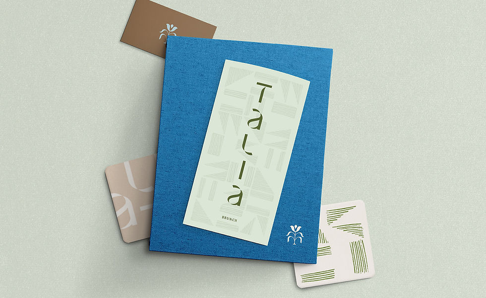 Custom designed menu suite and coasters on a seafoam green background