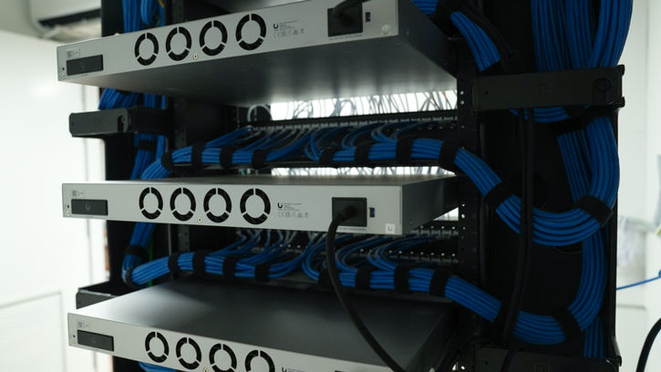 Network rack equipment with organized blue cable management