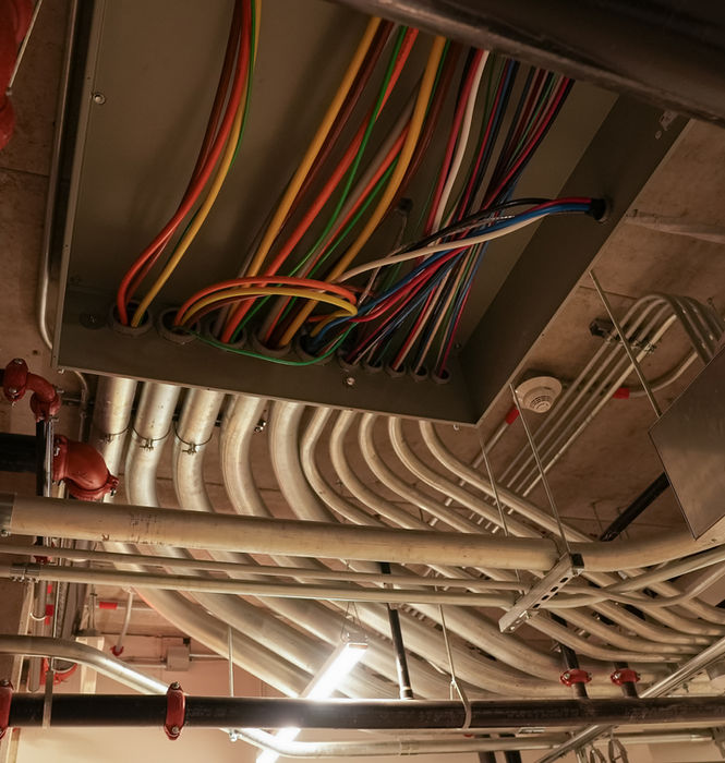 Organized building mechanical systems with piping and conduit