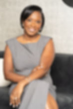 Velera Wilson in a gray dress