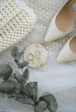 Clutch, heels, veil, wedding ring - the bride-to-be's accessories.