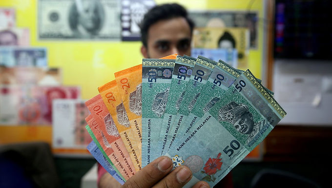 Ringgit edges up as softer US yields weigh on greenback