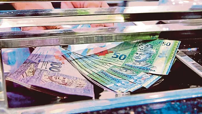 Ringgit opens firmer against US dollar on weaker greenback