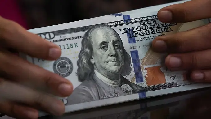 Dollar eases with oil on hopes of swift end to Iran war