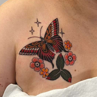 Cover up tattoo, colorful butterfly with flowers