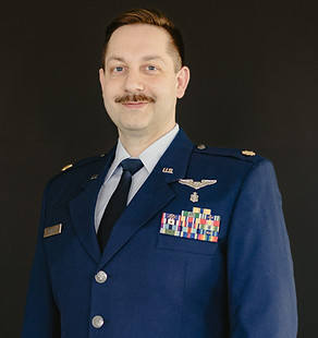 Dr. Nemero in an Air Force uniform with service ribbons.