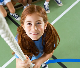 Girl climbing rope