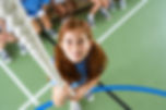 Girl climbing rope