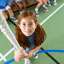 Girl climbing rope