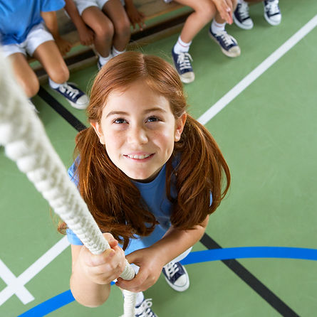 Girl climbing rope